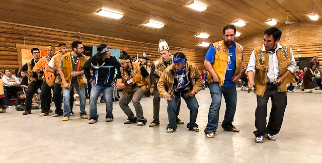 Minto potlatch, AK Native men dancing